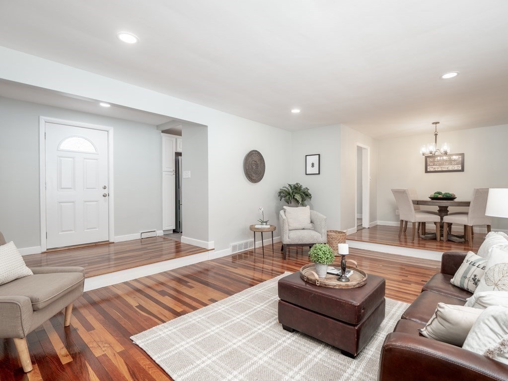 39 Marilyn Road Andover, MA 01810 - Photo 7 of 28 a living room with furniture window and a table