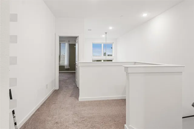 a view of a kitchen with a sink