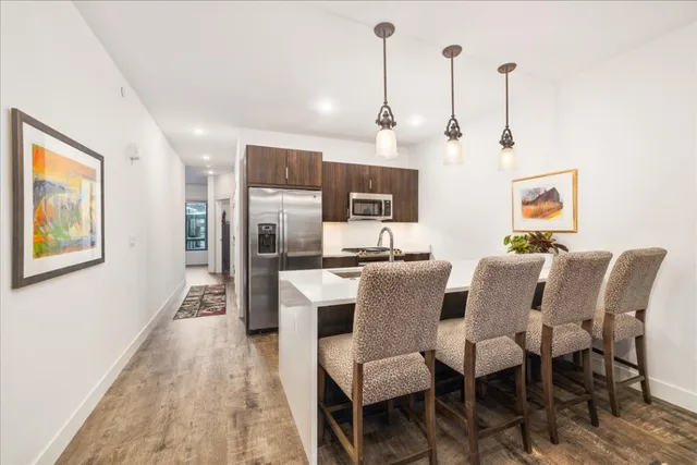 a view of a dining room with furniture