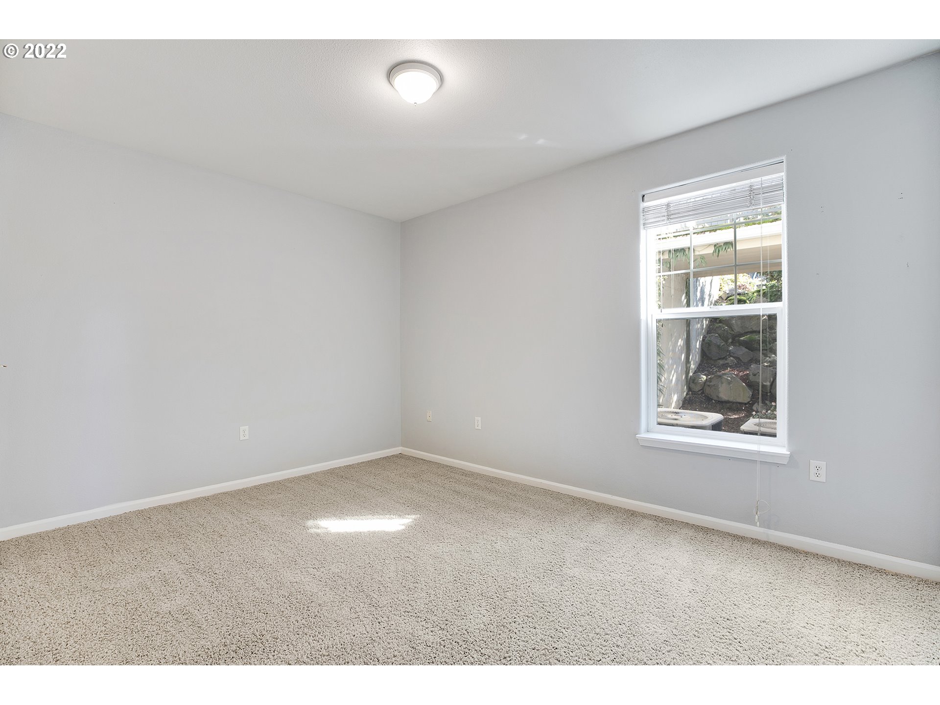 595 Springtree Lane West Linn, OR 97068 - Photo 18 of 28 a view of an empty room with a window