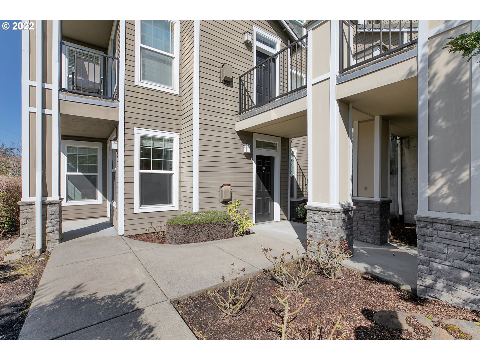 595 Springtree Lane West Linn, OR 97068 - Photo 3 of 28 a view of a house with a patio
