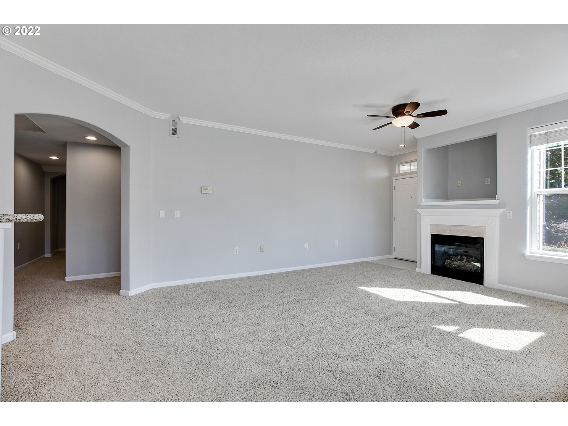 595 Springtree Lane West Linn, OR 97068 - Photo 6 of 28 a view of an empty room with a fireplace