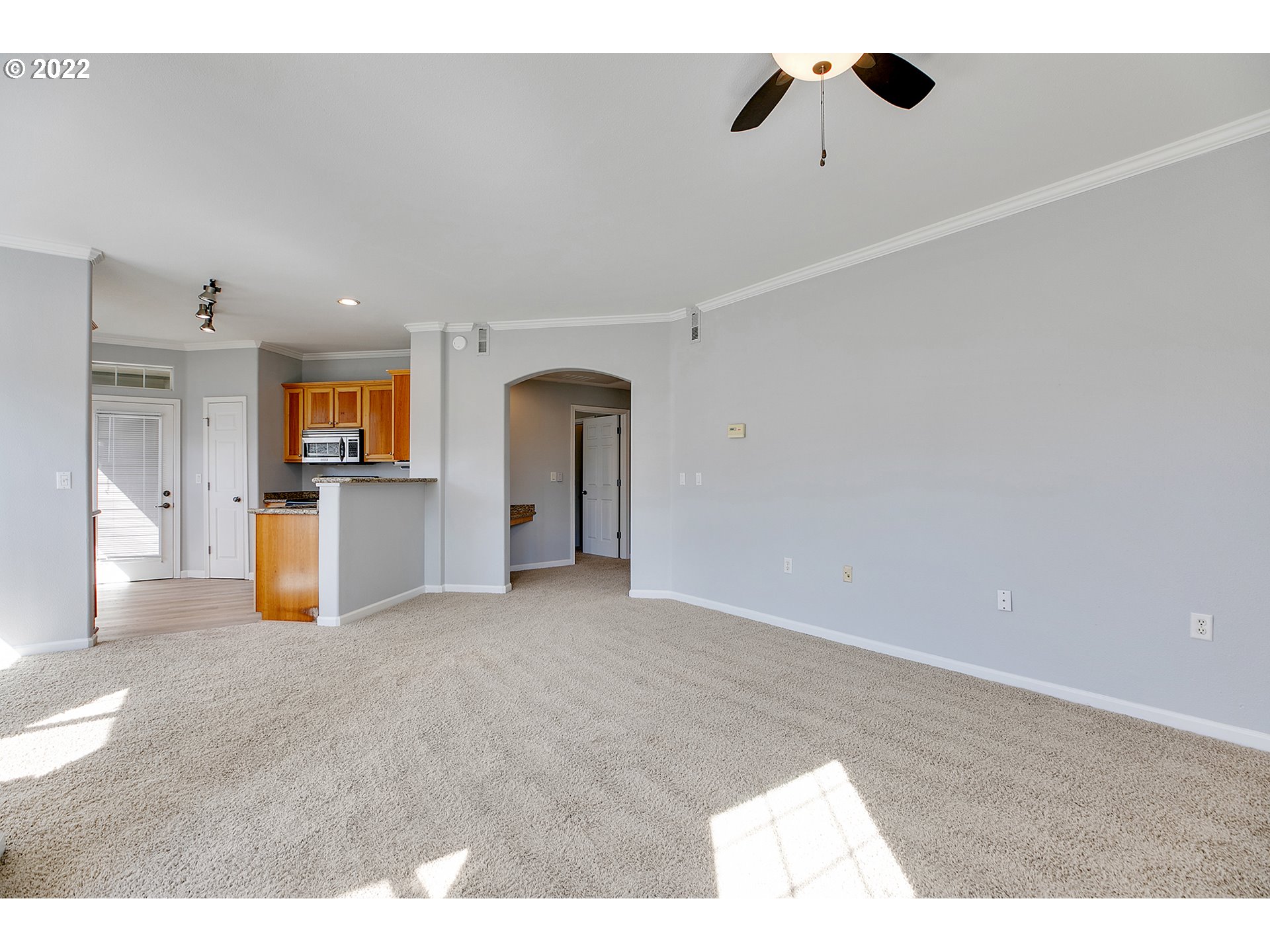 595 Springtree Lane West Linn, OR 97068 - Photo 7 of 28 a view of empty room with wooden floor