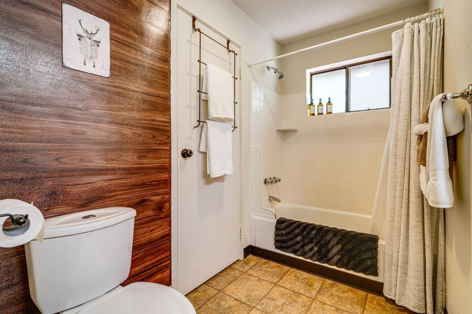 41080 Putt Road Alta, CA 95715 - Photo 14 of 17 a bathroom with a toilet and a shower