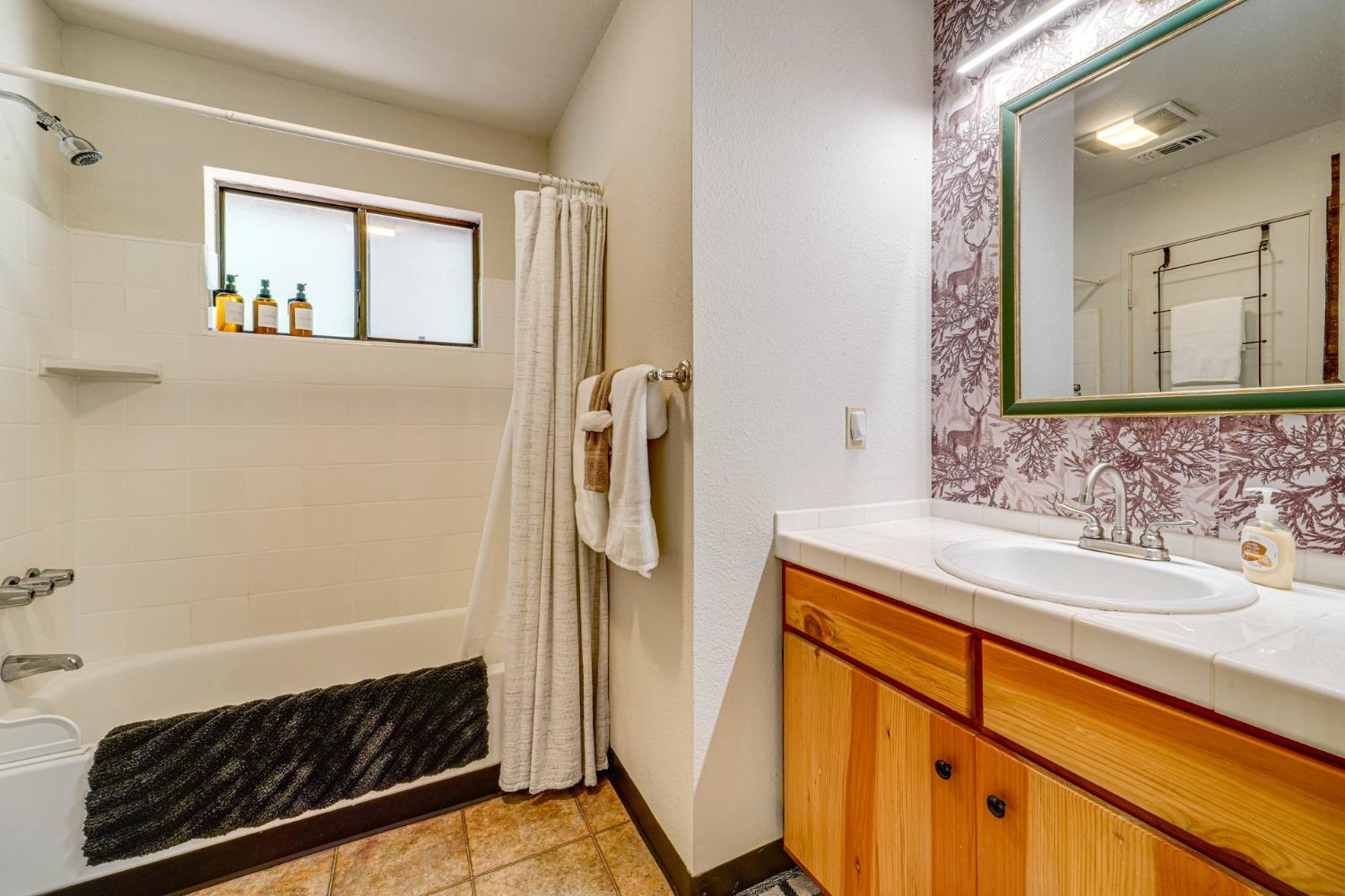 41080 Putt Road Alta, CA 95715 - Photo 6 of 17 a bathroom with a sink and a mirror