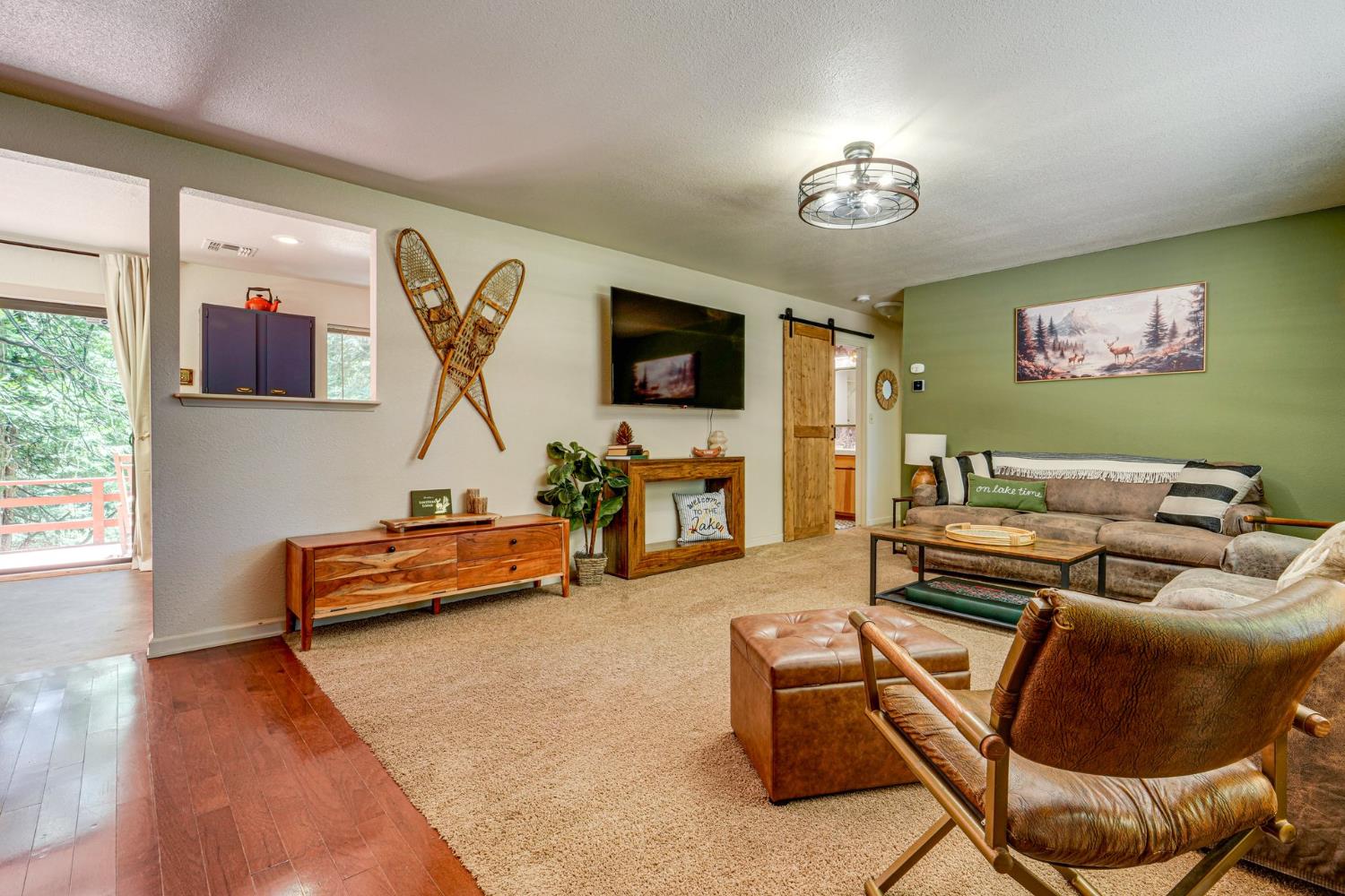 41080 Putt Road Alta, CA 95715 - Photo 7 of 17 a living room with furniture and a flat screen tv