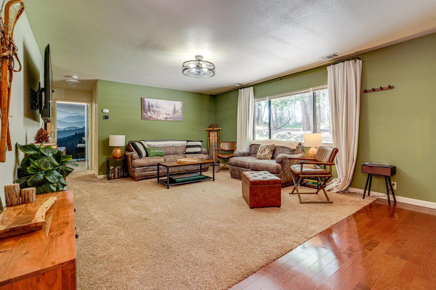41080 Putt Road Alta, CA 95715 - Photo 8 of 17 a living room with furniture and a large window