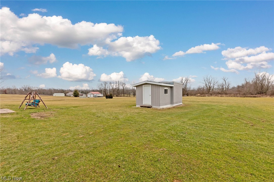 411 Adario West Road Shiloh, OH 44878 - Photo 31 of 35 View of yard with a shed