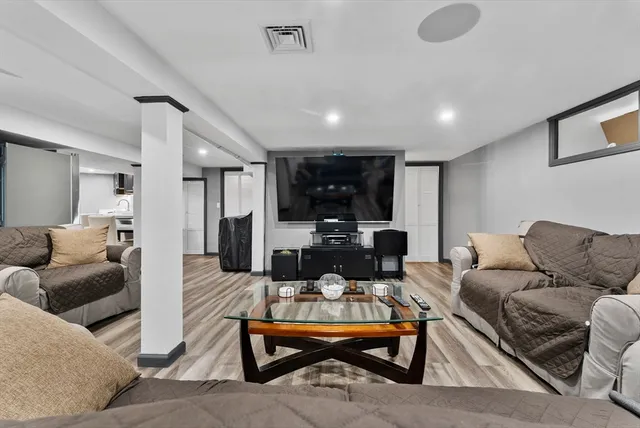 a bathroom with a toilet sink and a shower