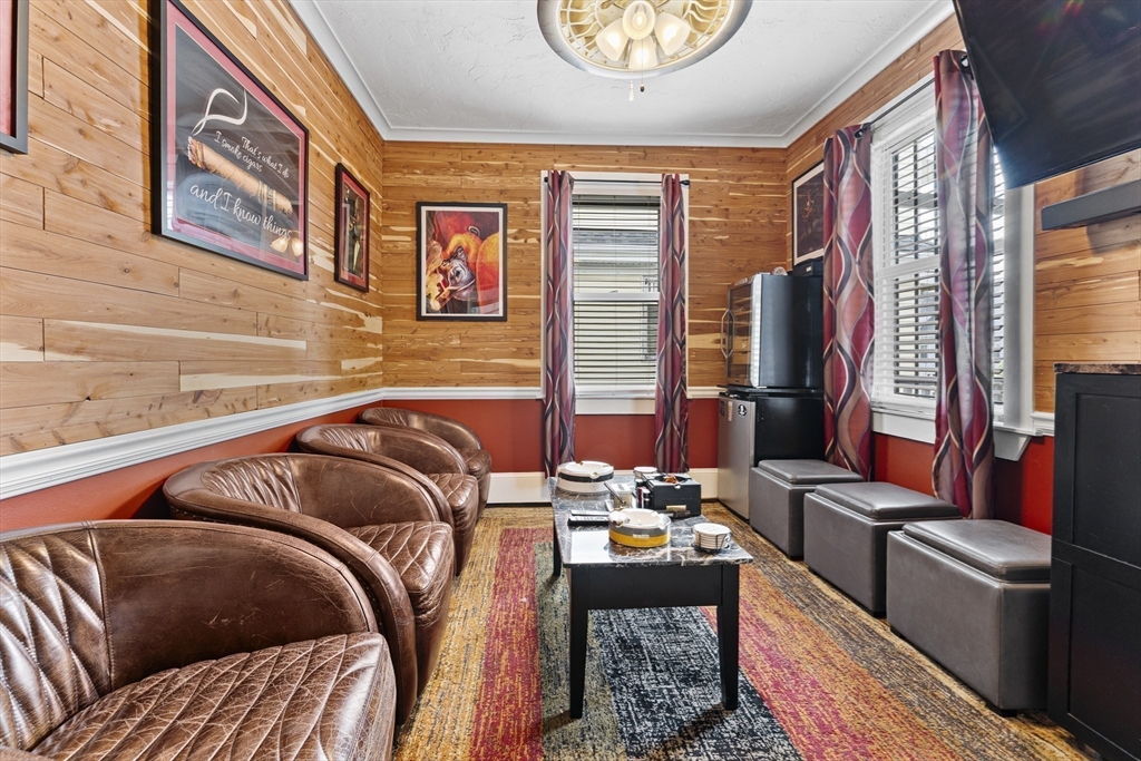 69 Greenwood Street Boston, MA 02121 - Photo 37 of 42 a bedroom with furniture and a bathtub