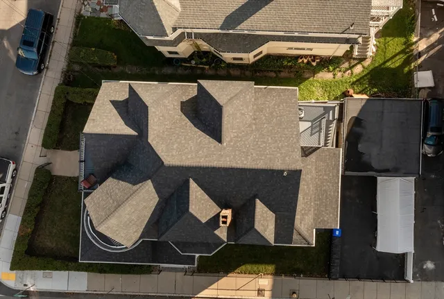 an aerial view of residential house with outdoor space