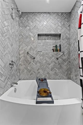 a bathroom with a bathtub