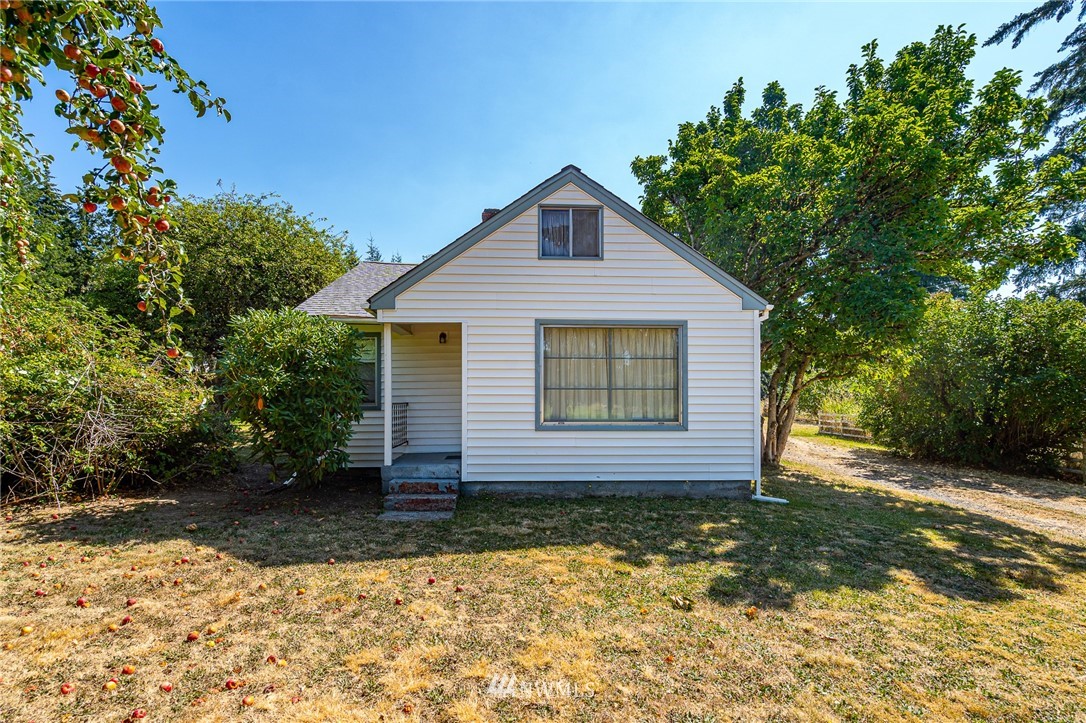 1458 Rush Road Chehalis, WA 98532 - Photo 1 of 40 a view of a house with a yard