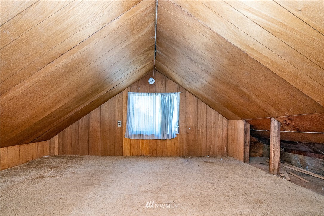 1458 Rush Road Chehalis, WA 98532 - Photo 14 of 40 a view of empty room with wooden floor
