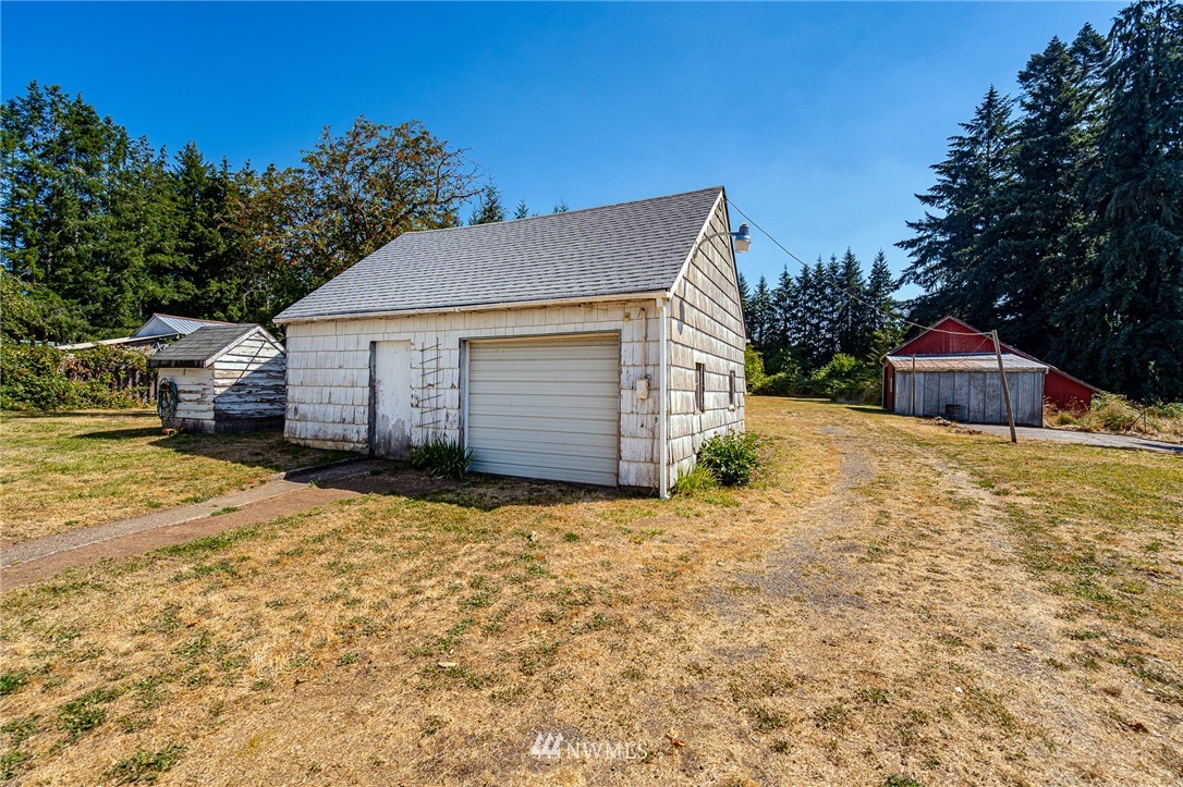 1458 Rush Road Chehalis, WA 98532 - Photo 17 of 40 a front view of a house with a yard