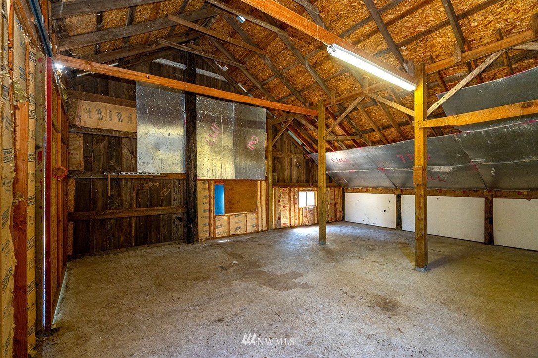 1458 Rush Road Chehalis, WA 98532 - Photo 25 of 40 a view of empty room with wooden floor