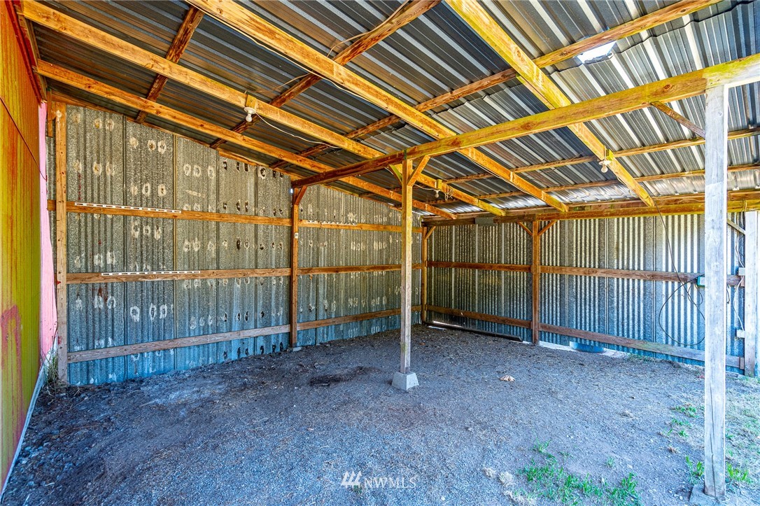 1458 Rush Road Chehalis, WA 98532 - Photo 27 of 40 a view of an empty room with wooden fence