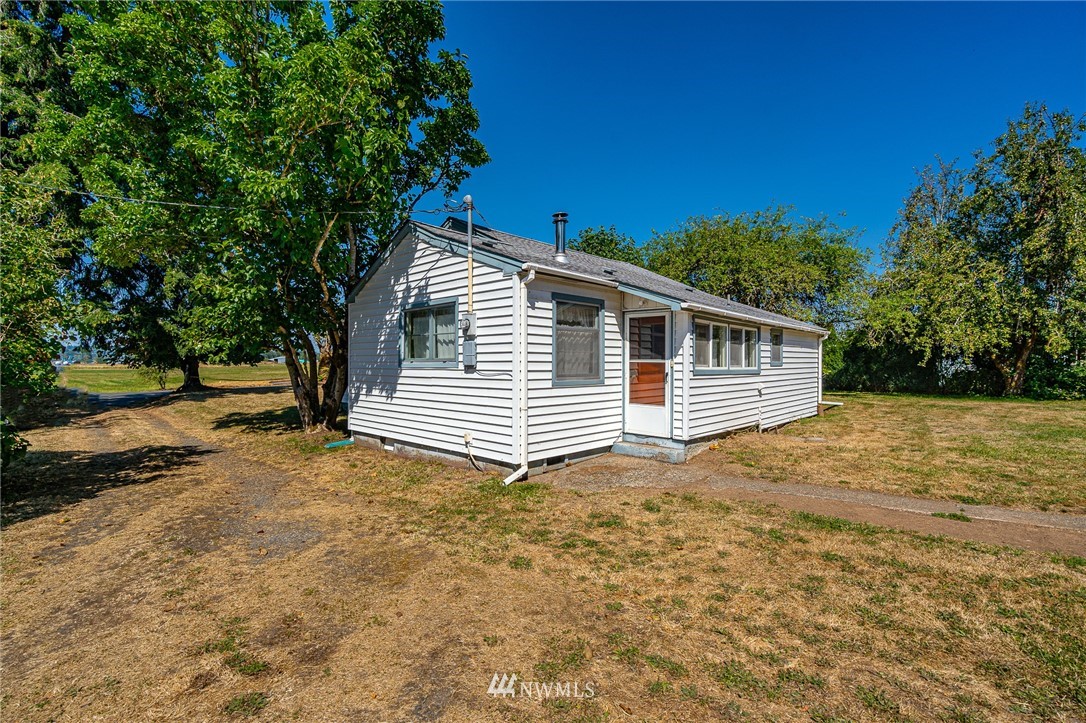 1458 Rush Road Chehalis, WA 98532 - Photo 5 of 40 a view of a house with a yard