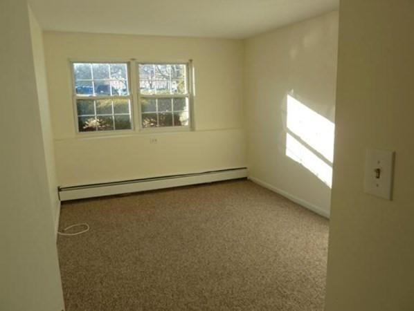 67 Fernview Avenue, Unit 2 North Andover, MA 01845 - Photo 6 of 8 a view of an empty room with a window