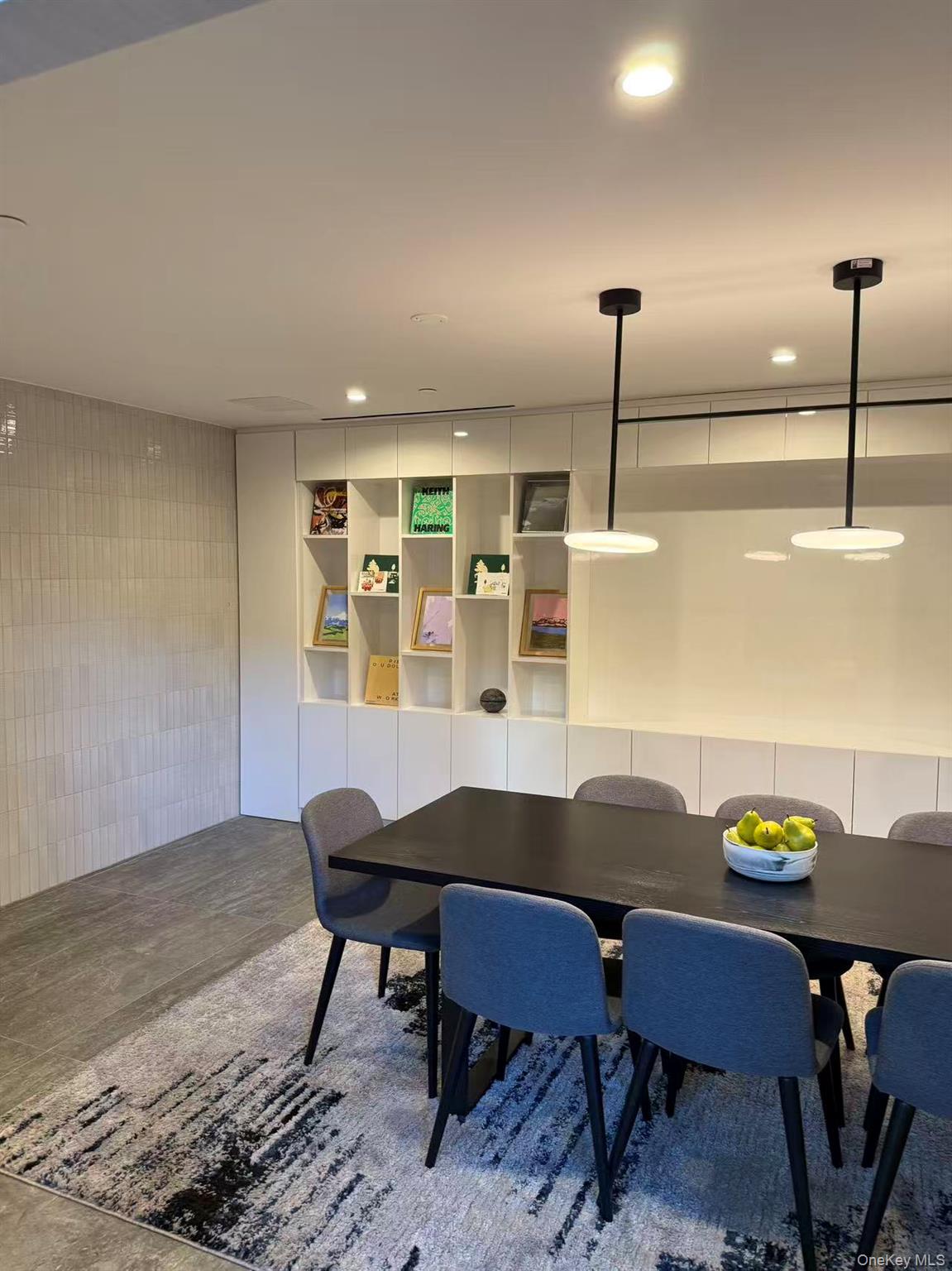 131-02 40th Road, Unit 6G Queens, NY 11354 - Photo 3 of 11 a view of a dining room with furniture