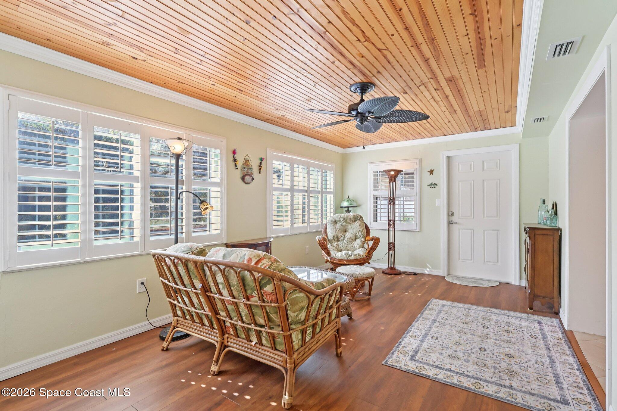 1945 Madison Avenue Melbourne, FL 32935 - Photo 15 of 33 a living room with furniture and a large window
