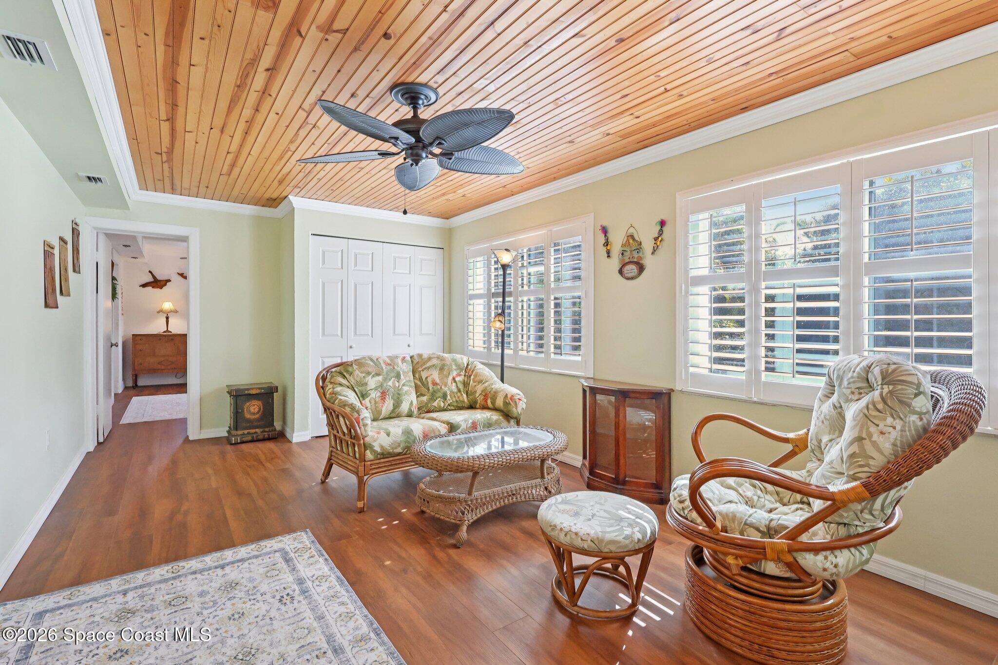 1945 Madison Avenue Melbourne, FL 32935 - Photo 16 of 33 a living room with fireplace furniture and a large window