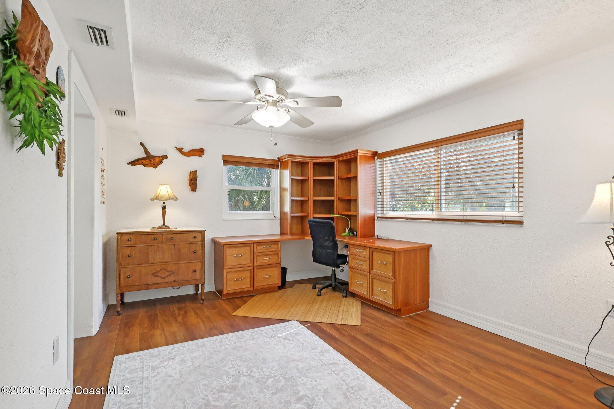 1945 Madison Avenue Melbourne, FL 32935 - Photo 17 of 33 a living room with furniture and wooden floor