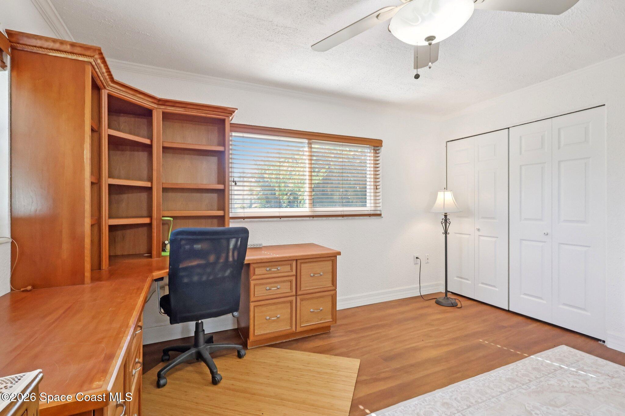 1945 Madison Avenue Melbourne, FL 32935 - Photo 18 of 33 a workspace with furniture and a window