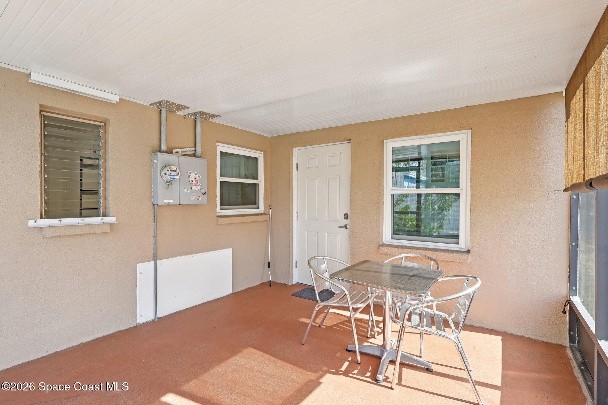 1945 Madison Avenue Melbourne, FL 32935 - Photo 28 of 33 a workspace room with furniture and windows