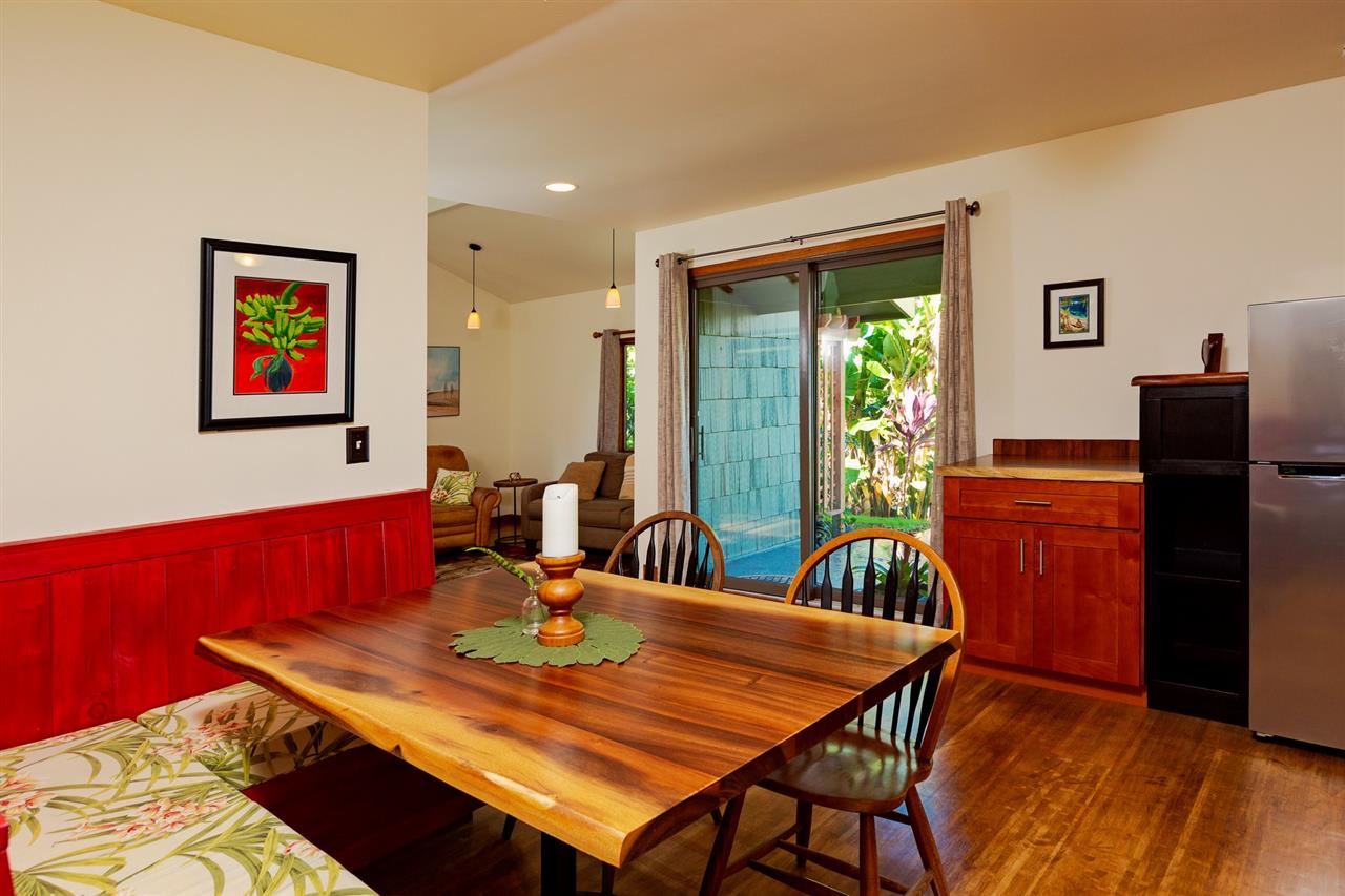 718 Holopuni Road Kula, HI 96790 - Photo 11 of 21 a view of a dining room with furniture window and wooden floor