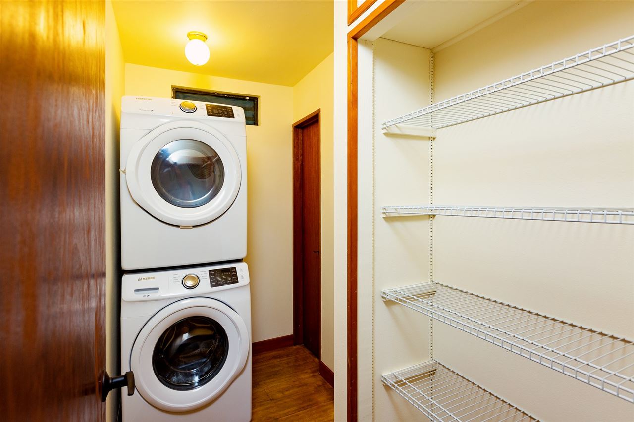718 Holopuni Road Kula, HI 96790 - Photo 15 of 21 a view of a hallway with washer and dryer