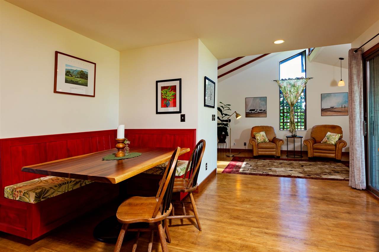 718 Holopuni Road Kula, HI 96790 - Photo 7 of 21 a view of a dining room with furniture and wooden floor