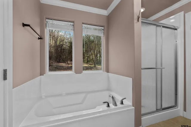 a view of a hallway with staircase