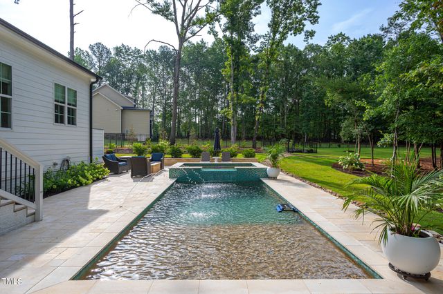an aerial view of residential house with outdoor space