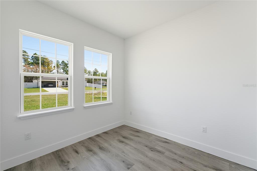 2600 Southwest 146th Pl Road Ocala, FL 34473 - Photo 10 of 40 an empty room with a window