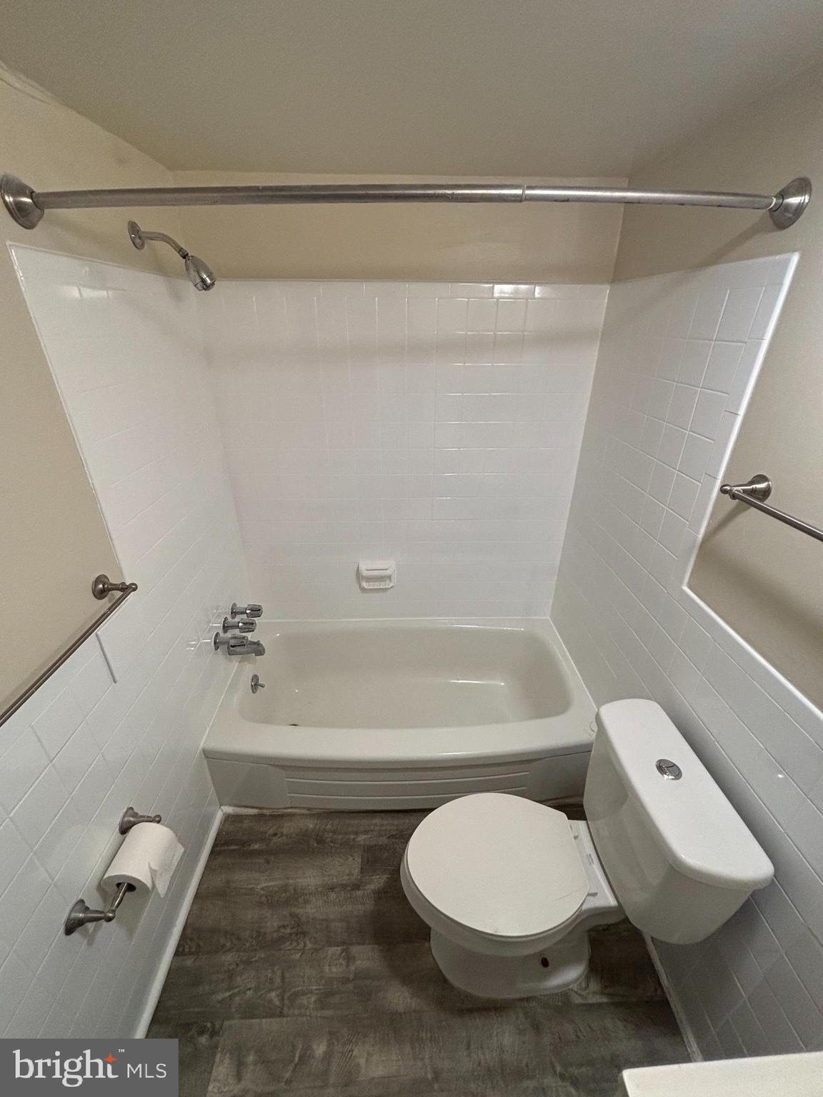 3827 St Barnabas Road, Unit T 103 Suitland, MD 20746 - Photo 13 of 15 a bathroom with a toilet and a bathtub
