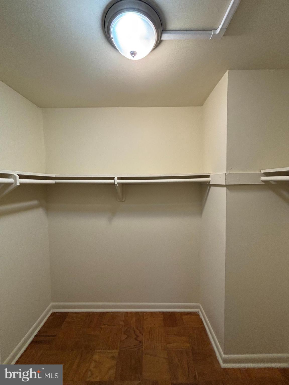 3827 St Barnabas Road, Unit T 103 Suitland, MD 20746 - Photo 14 of 15 a view of a room with racks on the wall