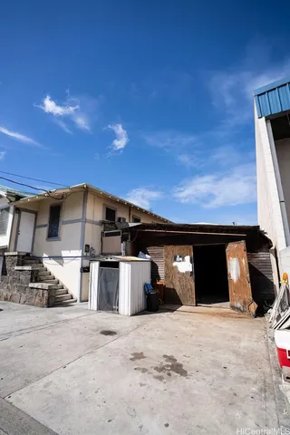 a view of a garage with wooden walls