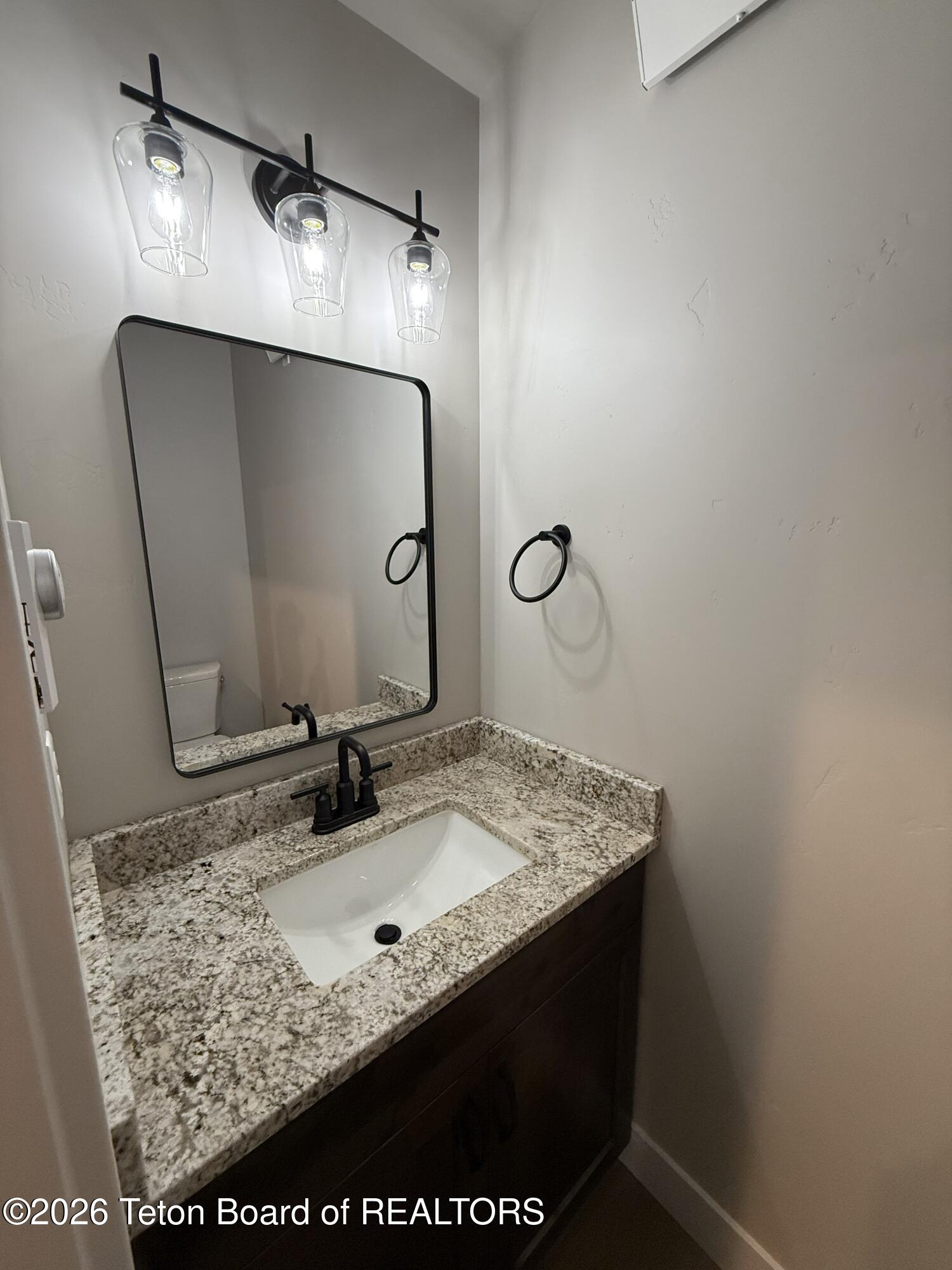 147 Last Chance Drive Star Valley Ranch, WY 83127 - Photo 18 of 36 Half Bath