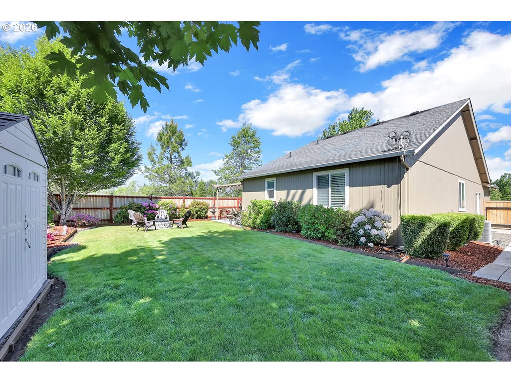 87836 8th Street Veneta, OR 97487 - Photo 22 of 25 a view of backyard with seating area and green space