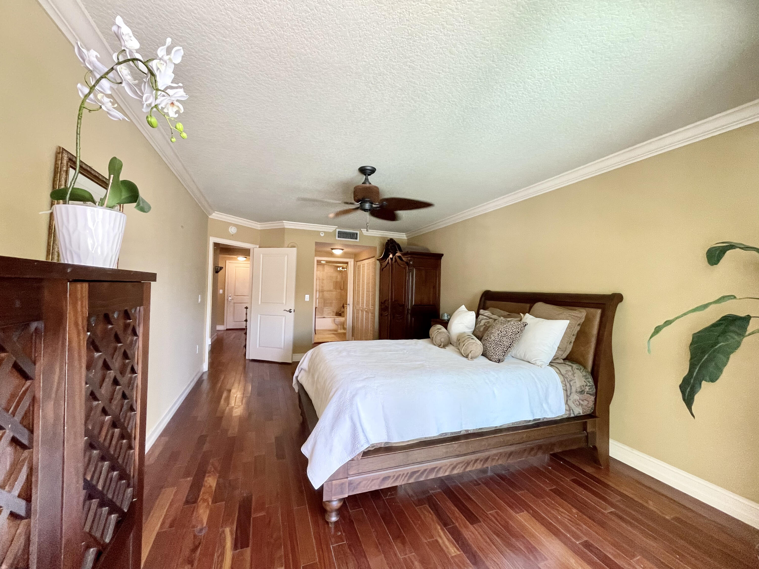 99 Southeast Mizner Boulevard, Unit 223 Boca Raton, FL 33432 - Photo 14 of 23 Bedroom w/hardwood floors