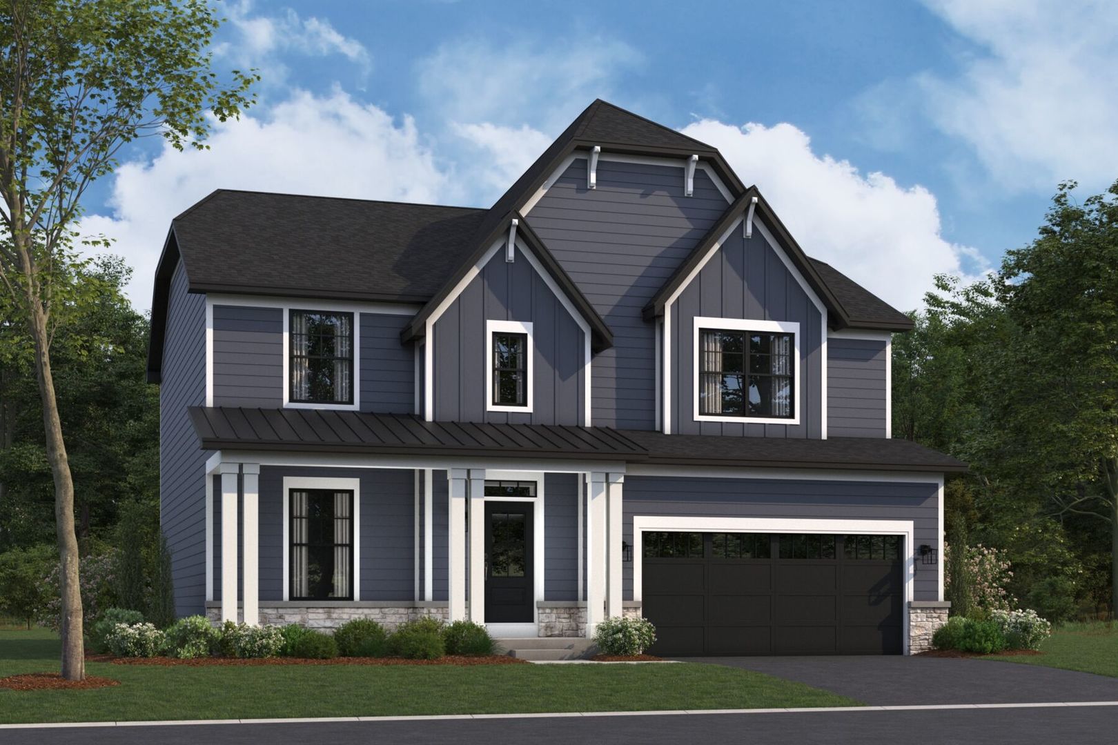 a front view of a house with yard and garage