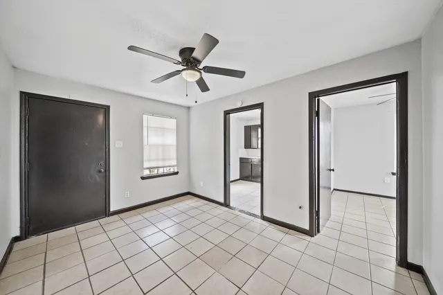 a view of an empty room and window