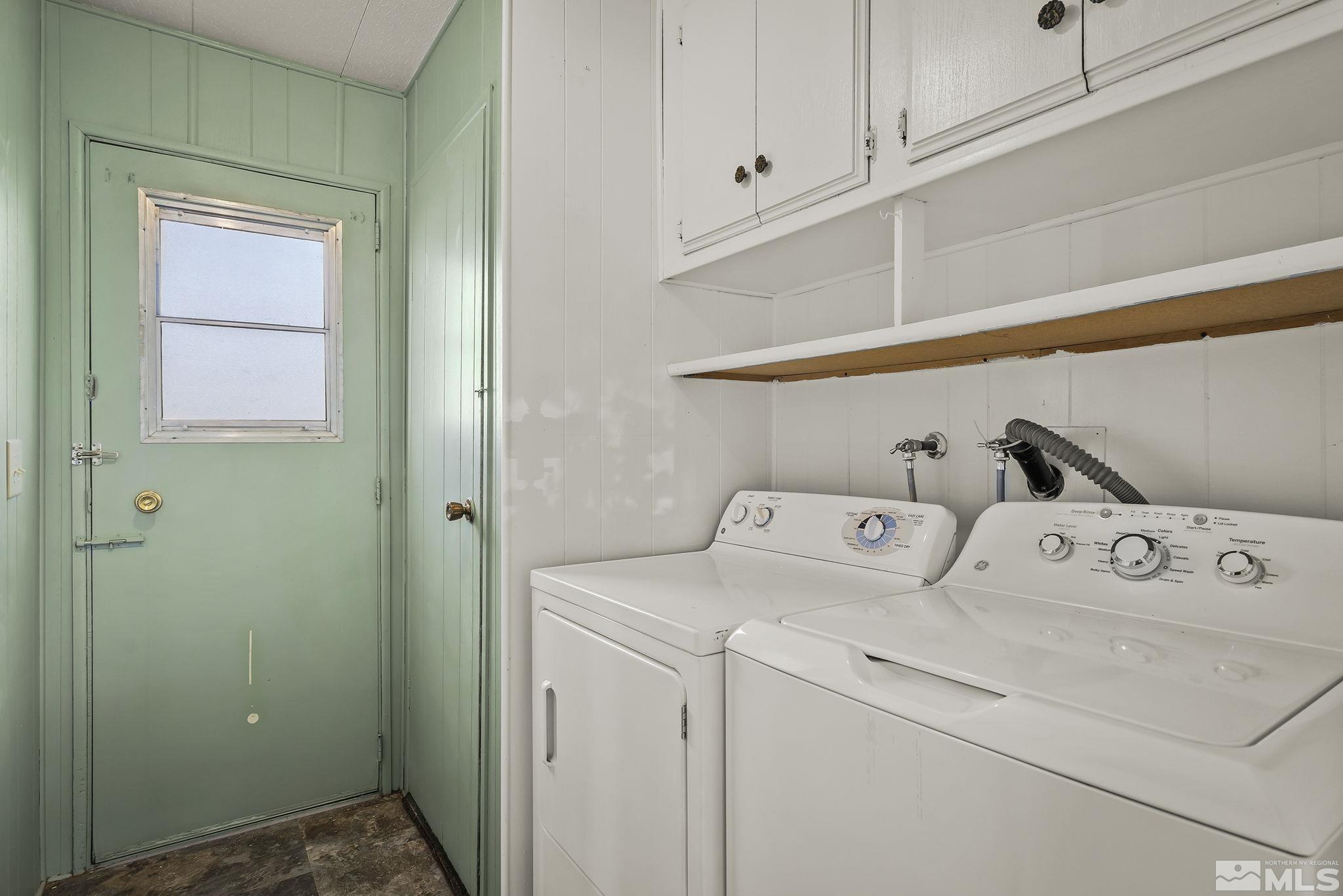 16305 Rhyolite Circle Reno, NV 89521 - Photo 16 of 16 a view of storage and utility room with washer and dryer