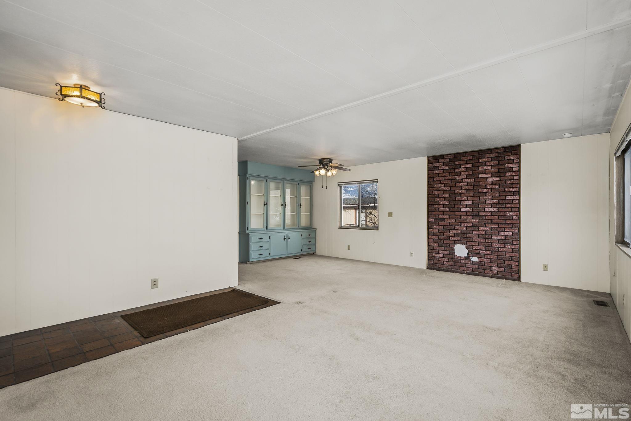 16305 Rhyolite Circle Reno, NV 89521 - Photo 4 of 16 an empty room with closet