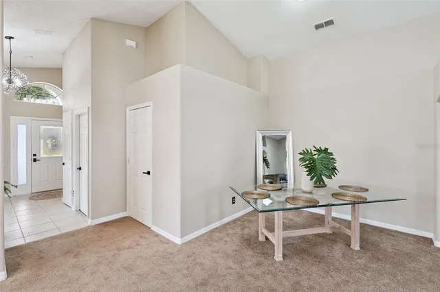 a workspace room with a bed and furniture