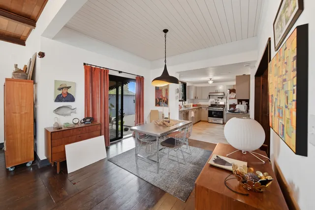 a view of a dining room with furniture