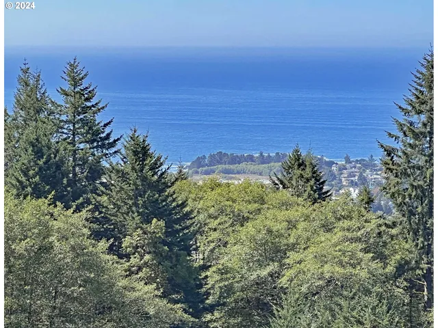 a view of a lake with a building in the background