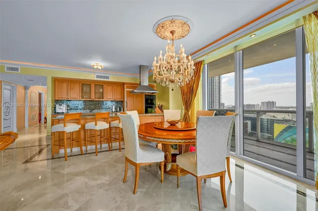 a view of a dining room with furniture window and outside view