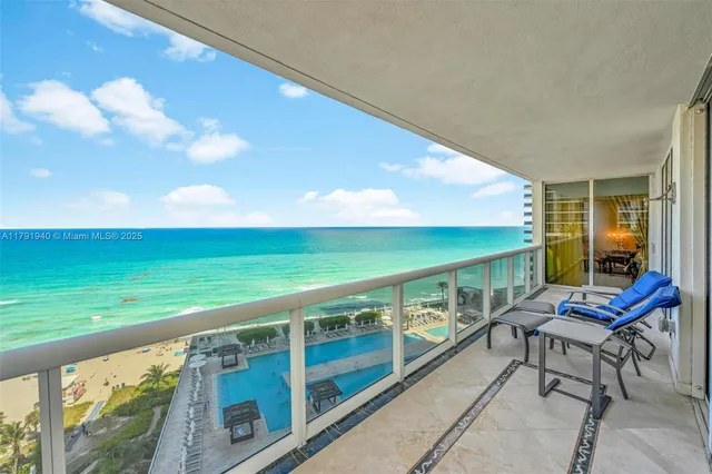 a balcony with an ocean view